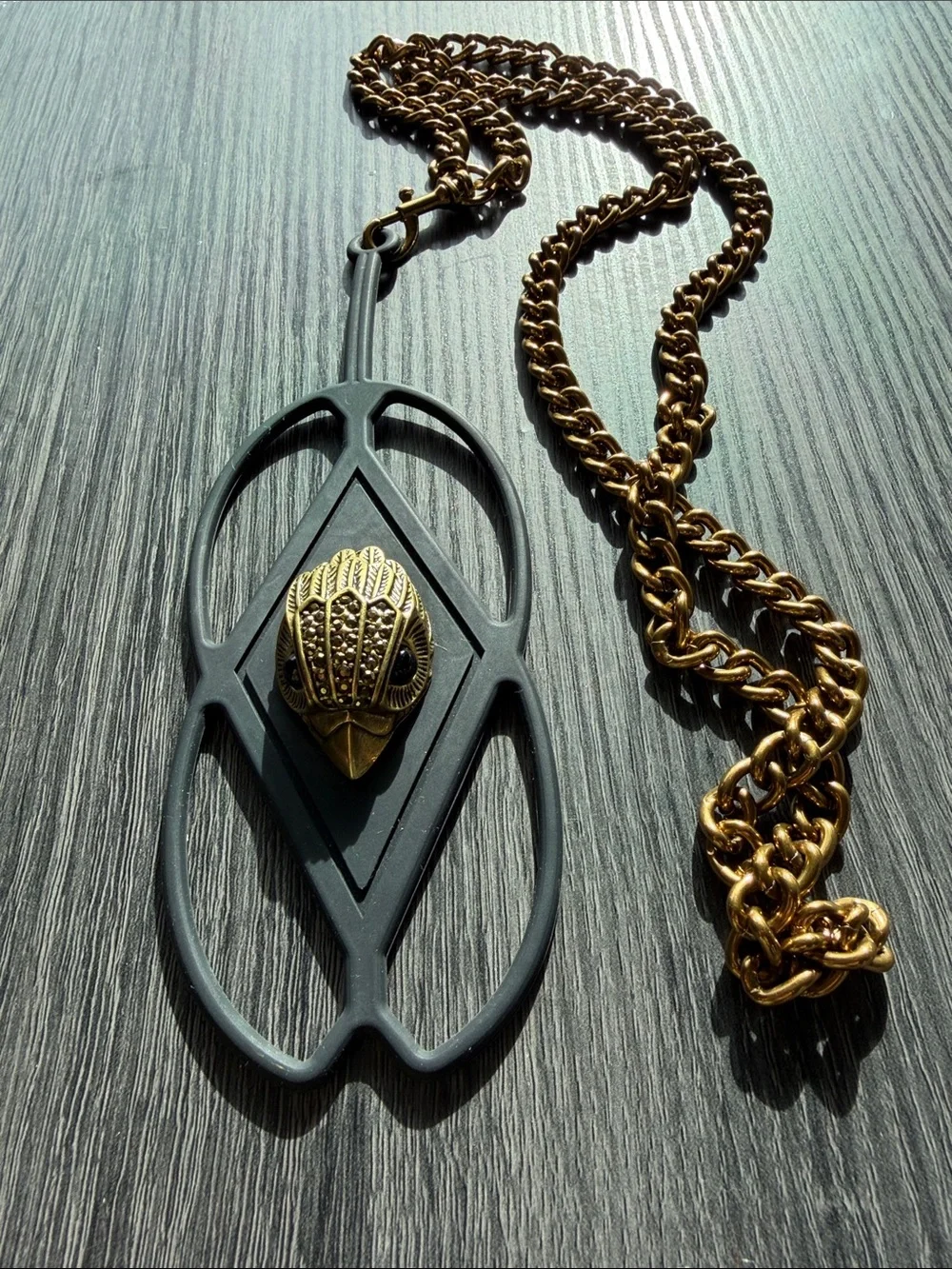 Kurt Geiger Black and Gold Eagle Phone Charm Chain